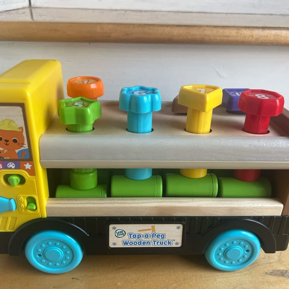 Colorful Tap-a-Peg Wooden Truck Toy